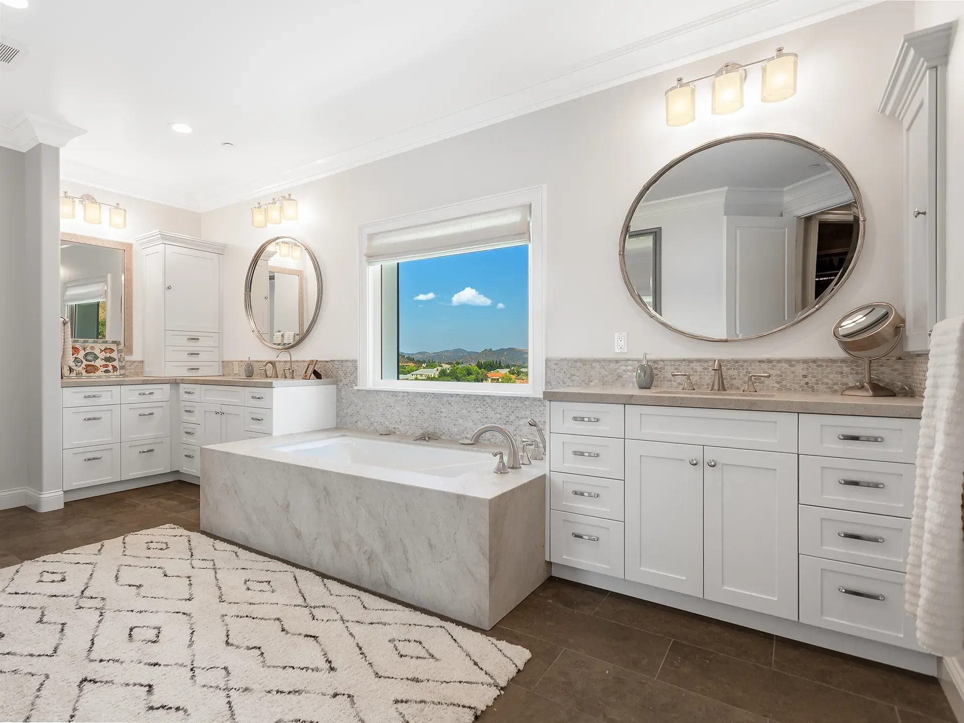 Remodeled master bathroom with soaking tub and double vanity