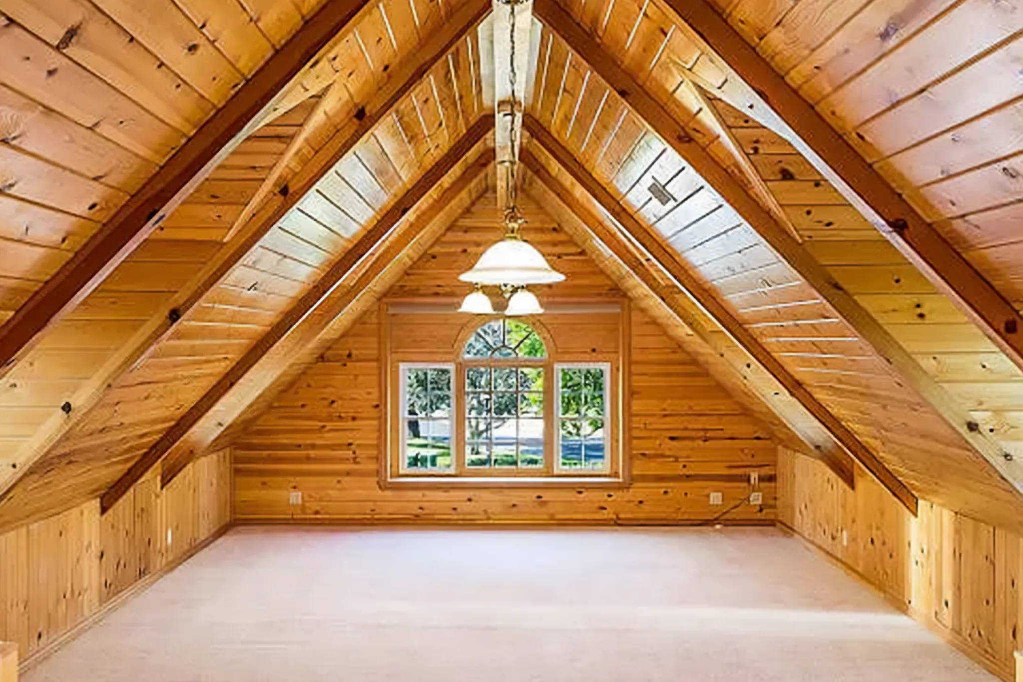 Attic bonus room before remodel, exposed wood framing