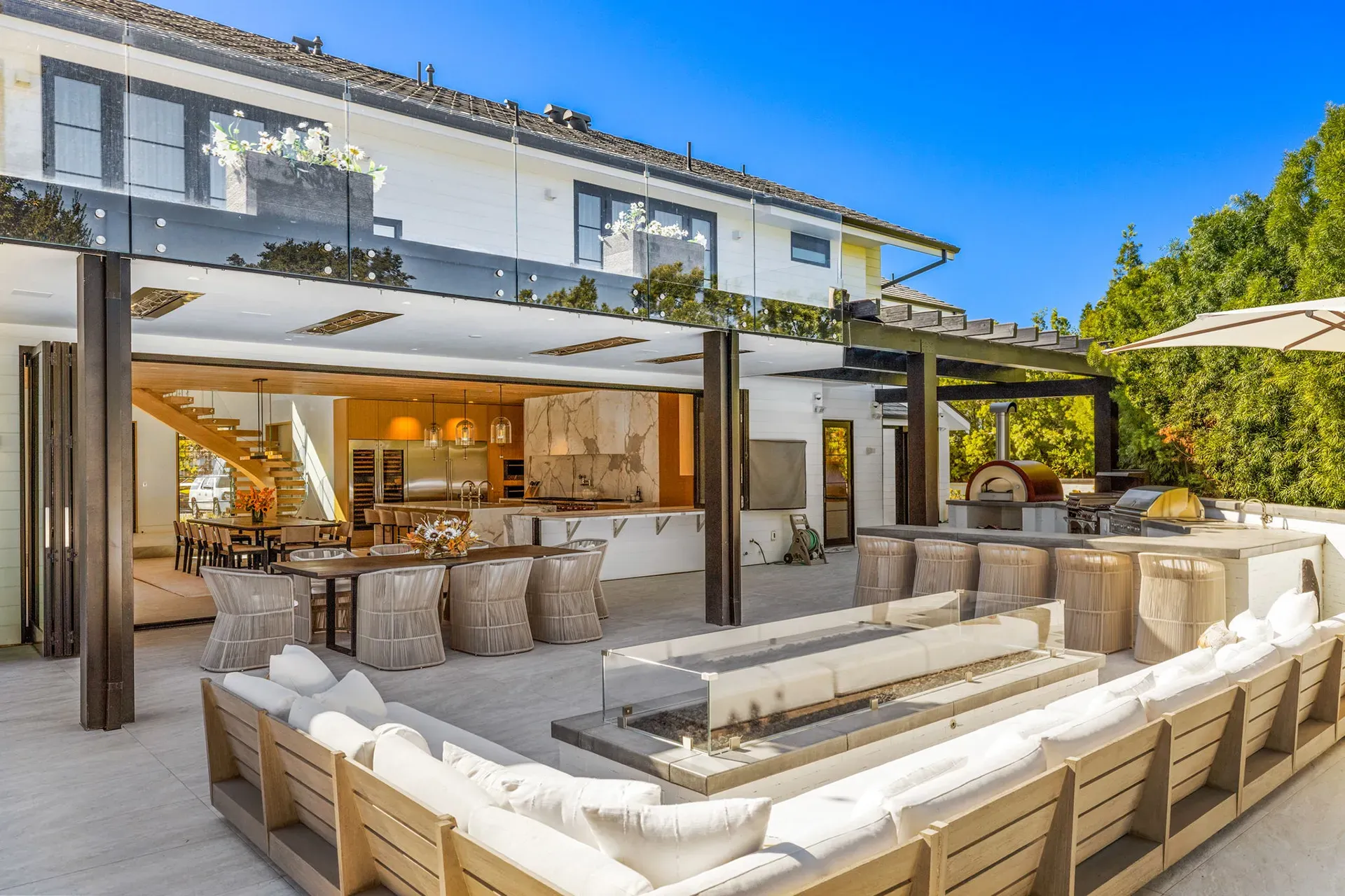 Combined deck and patio outdoor living space