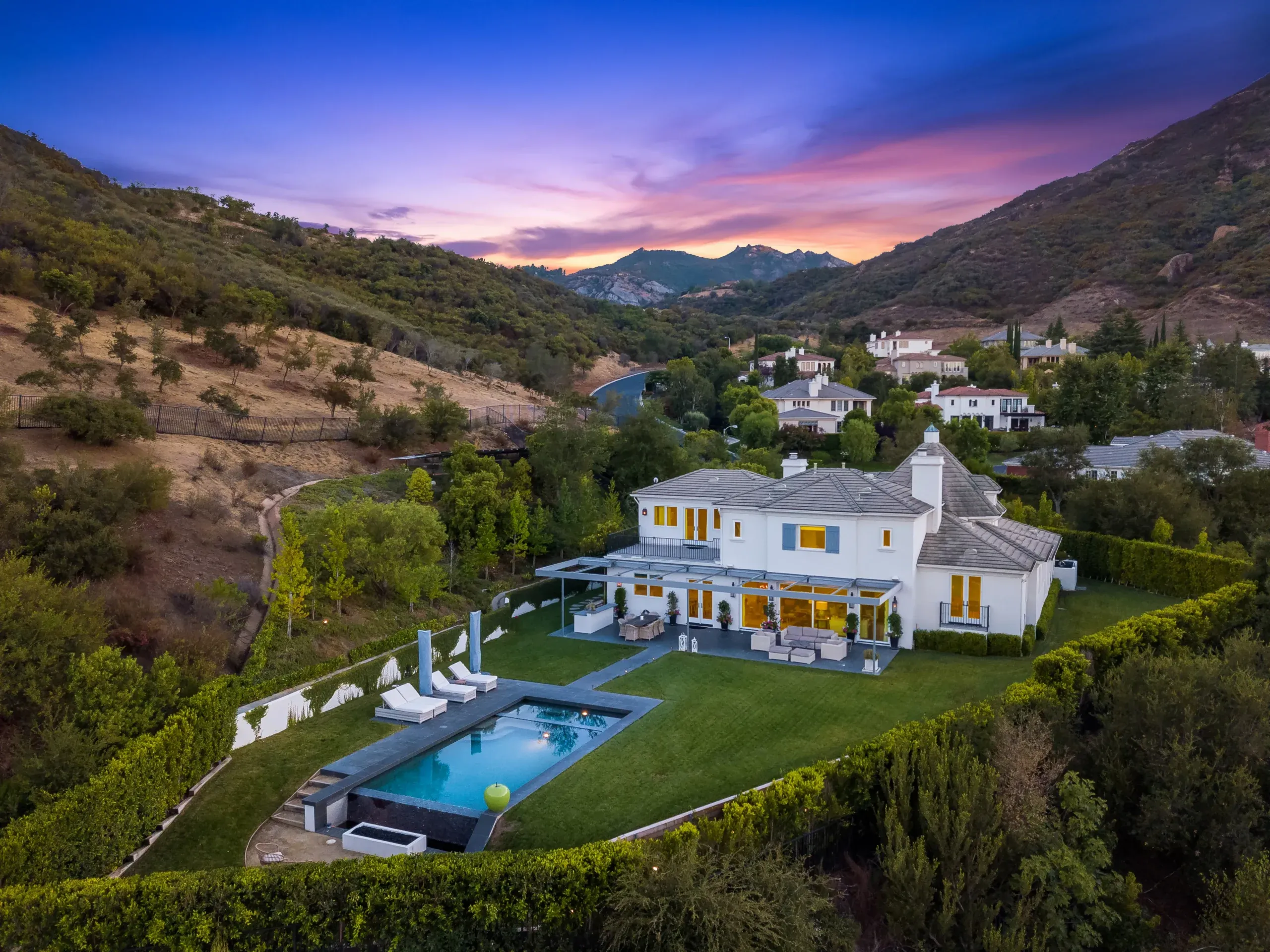 Custom home with pool at sunset, Lake Sherwood