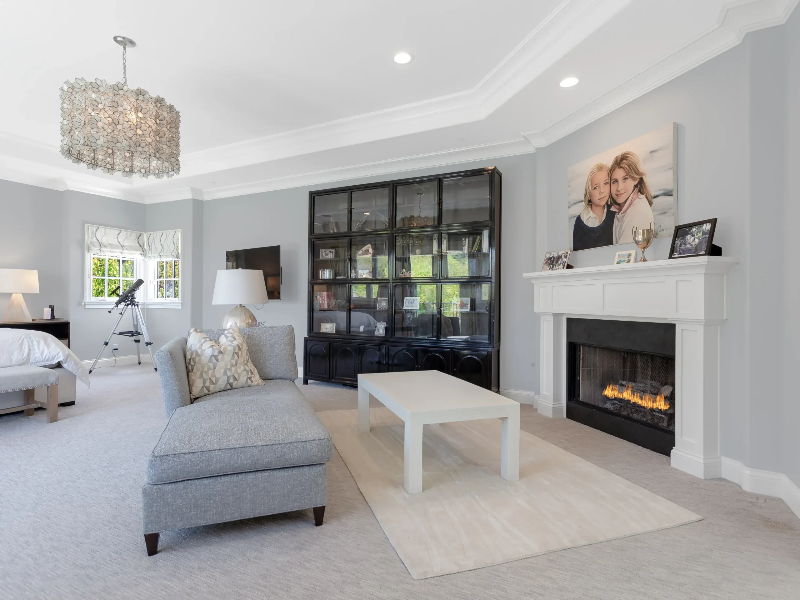 Primary suite sitting area with fireplace