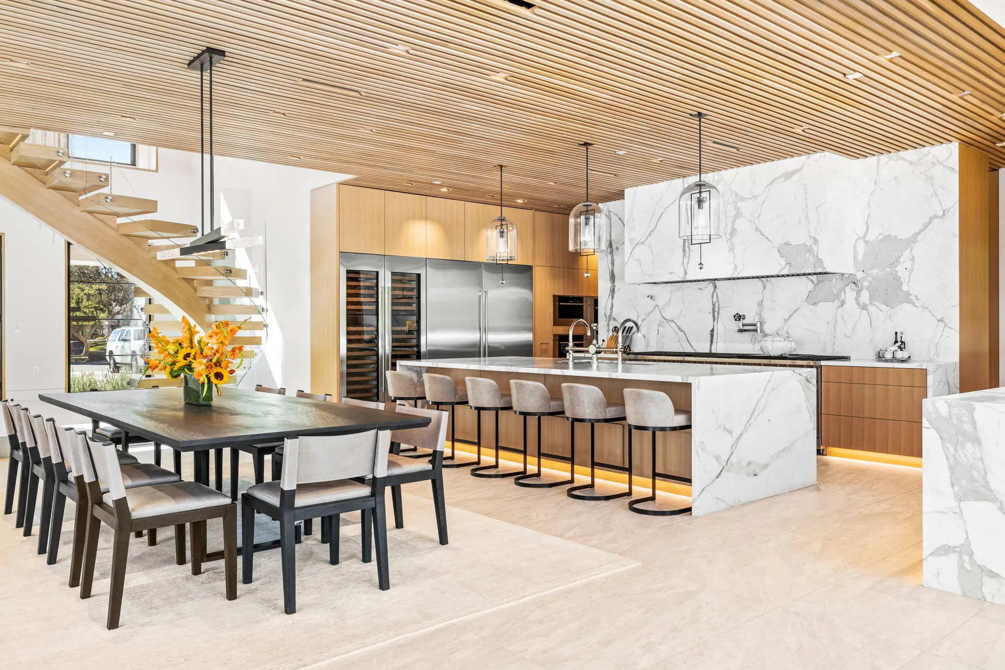 Marble kitchen remodel with waterfall island
